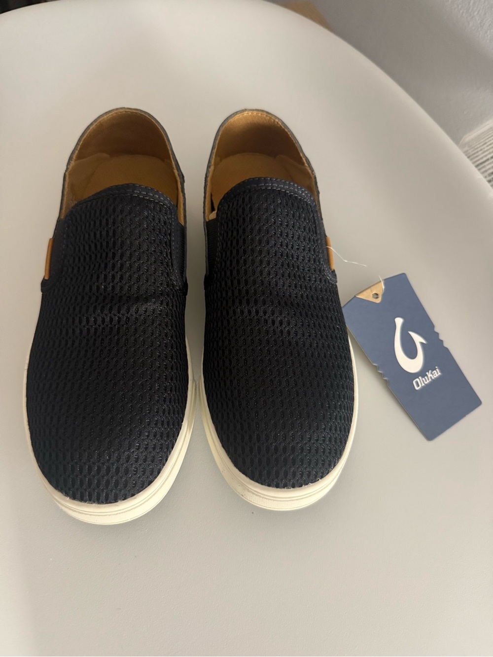 OluKai women’s  Black Slip-On Sneakers